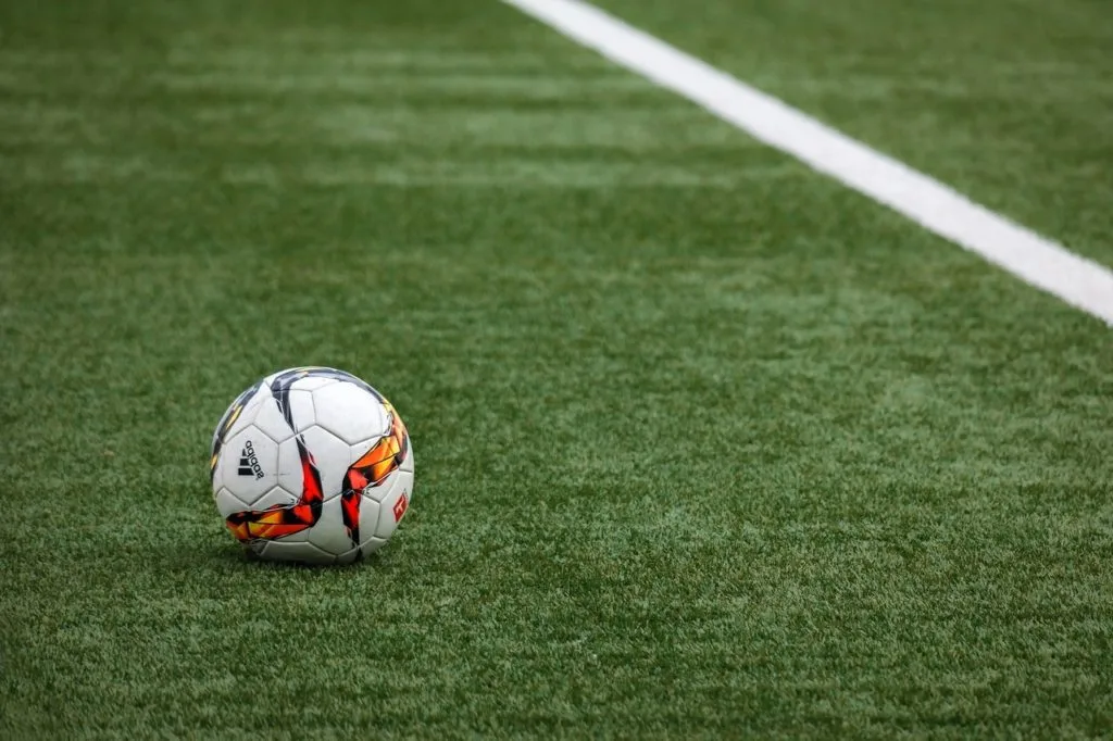 Close-up of soccer ball on grass